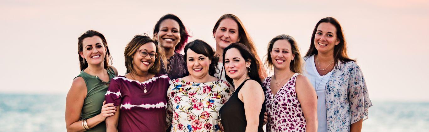 Women gathering together in a warm, welcoming community setting